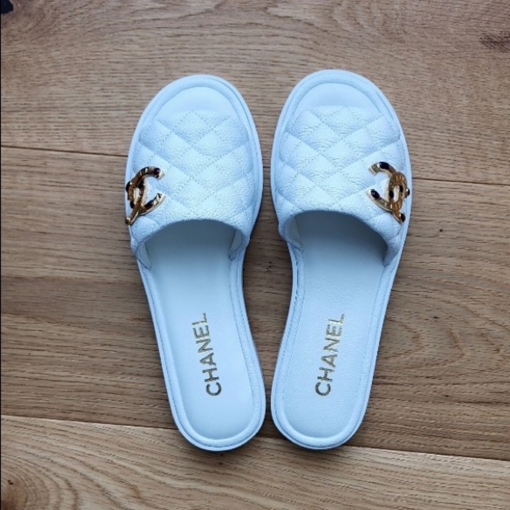 Brand new Chanel mules in White